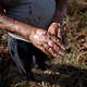 In a photo from 2010, Vidal Masachi, 56, explains she has suffered numerous health problems living in close proximity to Texaco’s pollution.